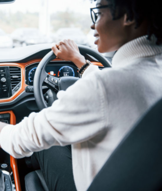 Woman takes car for a test drive
